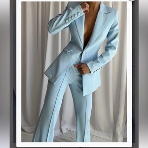Light blue women’s suit size 10.  NAOMA Blazer & Flared Pants Set in Columbia.